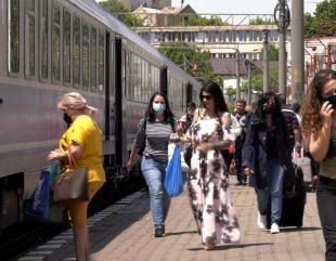 În vacanță, cu trenul