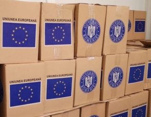 Începe distribuirea pachetelor pentru persoanele defavorizate