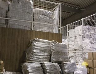Percheziții în dosarul hainelor second-hand